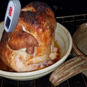 Tom invented the all ceramic vertical roasting chicken baker in about 1997