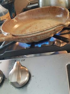 Heat the skillet on direct flame