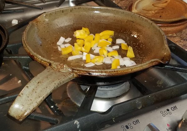 Saute omelette ingredients, then add eggs